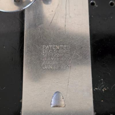 antique Singer treadle sewing machine with a wooden cabinet Complete with accessories and original manual