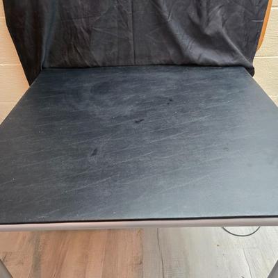 Cosco card table with black top and 4 matching folding chairs