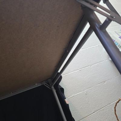 Cosco card table with black top and 4 matching folding chairs