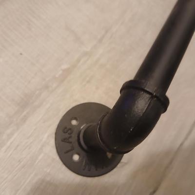 Home repair items - Black pipe mounted rail