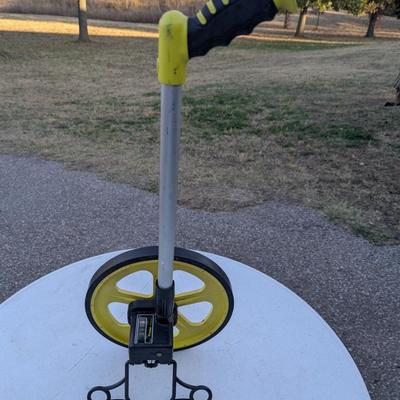 Sale Photo Thumbnail #157: Meter man by Konaelon- Measuring wheel