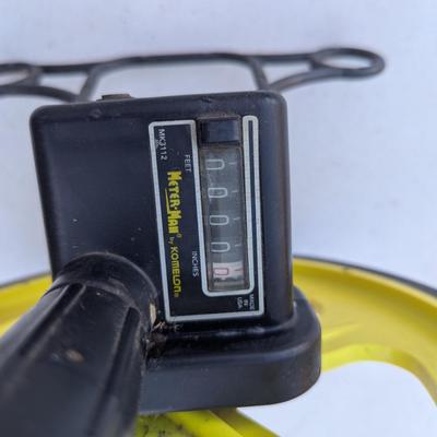 Sale Photo Thumbnail #160: Meter man by Konaelon- Measuring wheel