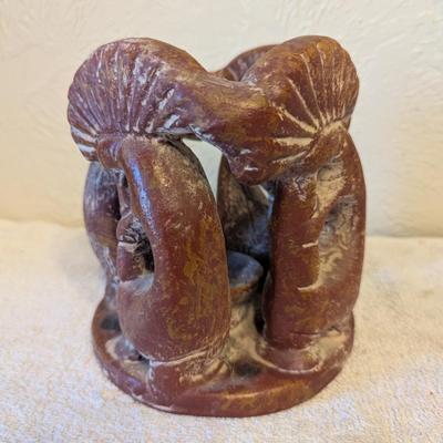 Sale Photo Thumbnail #1007: Circle of friends terra cotta tealight candle holder