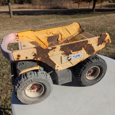 Sale Photo Thumbnail #1115: Tonka dump truck - plastic and metal.