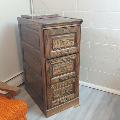 Three drawer wooden filing cabinet with a new 6 pocket expanding wallet