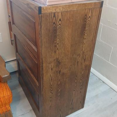 Three drawer wooden filing cabinet with a new 6 pocket expanding wallet