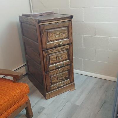 Three drawer wooden filing cabinet with a new 6 pocket expanding wallet