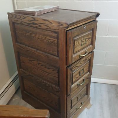 Three drawer wooden filing cabinet with a new 6 pocket expanding wallet