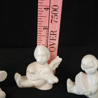 Collection of angels - small tri marked D Buxman - kitting pair marked with an "s"