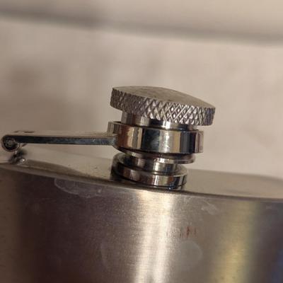 Sale Photo Thumbnail #1207: Zippo stainless teel flask