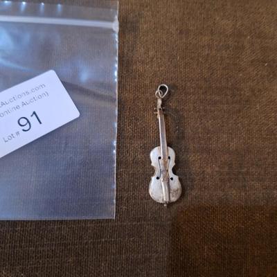 Sale Photo Thumbnail #421: We could not find a marking but this seems to be sterling,  the black parts polished off with a wet cloth and mild dish soap.