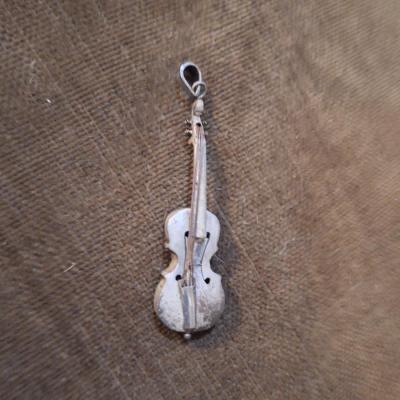 Sale Photo Thumbnail #420: We could not find a marking but this seems to be sterling,  the black parts polished off with a wet cloth and mild dish soap.