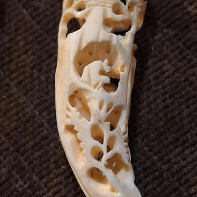 Sale Photo Thumbnail #429: set of 2 carved hippos teeth- we aren't sure how to verify this- they are part of an estate and simply were in a Ziplock back labeled hippo.  It looks like they seller might have paid $400 for them in the 70s or 80s from the scribbled notes- but again…w