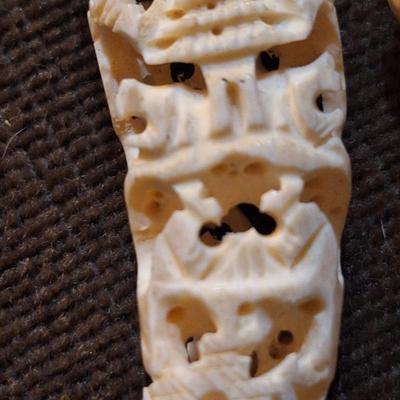 Sale Photo Thumbnail #431: set of 2 carved hippos teeth- we aren't sure how to verify this- they are part of an estate and simply were in a Ziplock back labeled hippo.  It looks like they seller might have paid $400 for them in the 70s or 80s from the scribbled notes- but again…w