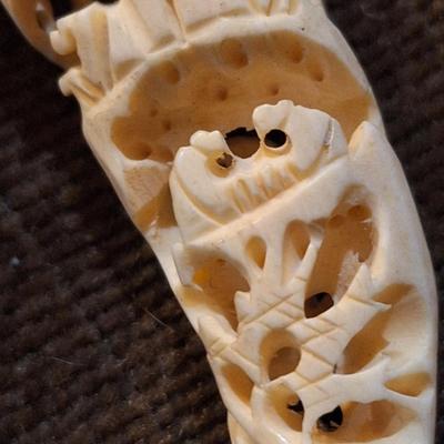 Sale Photo Thumbnail #432: set of 2 carved hippos teeth- we aren't sure how to verify this- they are part of an estate and simply were in a Ziplock back labeled hippo.  It looks like they seller might have paid $400 for them in the 70s or 80s from the scribbled notes- but again…w