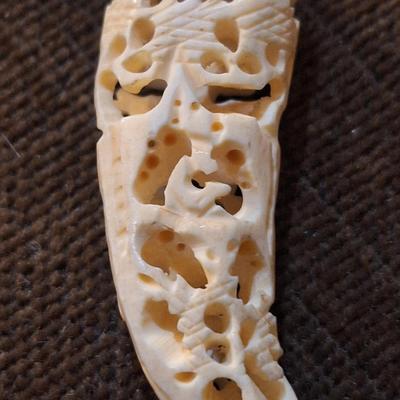 Sale Photo Thumbnail #428: set of 2 carved hippos teeth- we aren't sure how to verify this- they are part of an estate and simply were in a Ziplock back labeled hippo.  It looks like they seller might have paid $400 for them in the 70s or 80s from the scribbled notes- but again…w