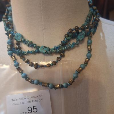 Sale Photo Thumbnail #440: turquoise in color.