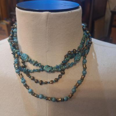 Sale Photo Thumbnail #441: turquoise in color.