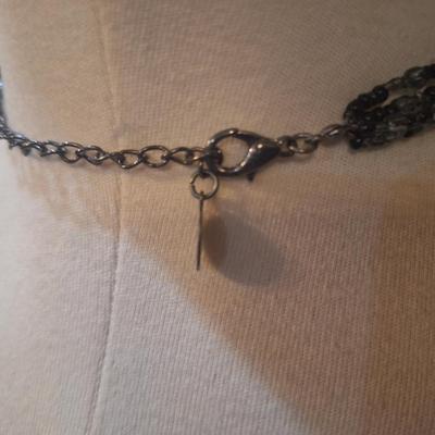 Sale Photo Thumbnail #453: earrings seem to be abalone parts of the necklace may be also.  