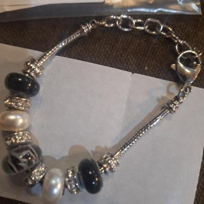 Sale Photo Thumbnail #456: charm bracelet- fits a larger wrist, 