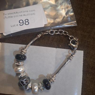 Sale Photo Thumbnail #454: charm bracelet- fits a larger wrist, 