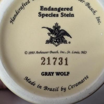 Handcrafted Endangered Species Steins "Gray Wolf & African Elephant"
