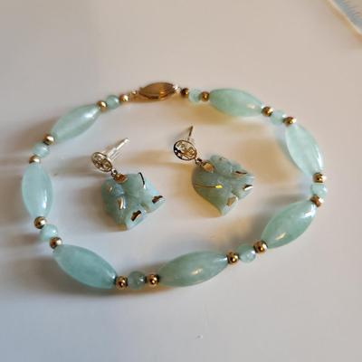 Sale Photo Thumbnail #237: This auction lot is for a Jade & 14K Gold Bracelet with a pair of Elephant Earrings.  This handsome luxury accessory is quite the tourist piece.  Both the bracelet and the earrings are marked 14K.