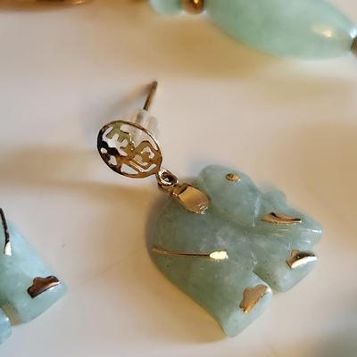 Sale Photo Thumbnail #238: This auction lot is for a Jade & 14K Gold Bracelet with a pair of Elephant Earrings.  This handsome luxury accessory is quite the tourist piece.  Both the bracelet and the earrings are marked 14K.