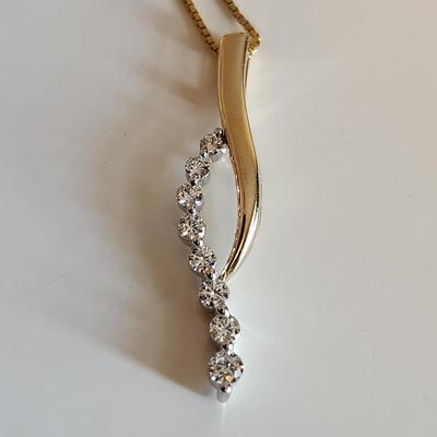 Sale Photo Thumbnail #246: This auction lot is for a 14K Gold & Diamond Necklace.  The necklace measures about 24-inches and is marked 14K. The stunning pendant is marked 14K and has eight chip stones tested as diamond.  This nifty item weighs about 5.1 grams by our scale.