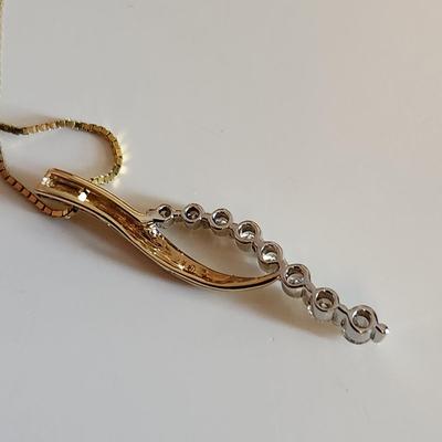Sale Photo Thumbnail #247: This auction lot is for a 14K Gold & Diamond Necklace.  The necklace measures about 24-inches and is marked 14K. The stunning pendant is marked 14K and has eight chip stones tested as diamond.  This nifty item weighs about 5.1 grams by our scale.