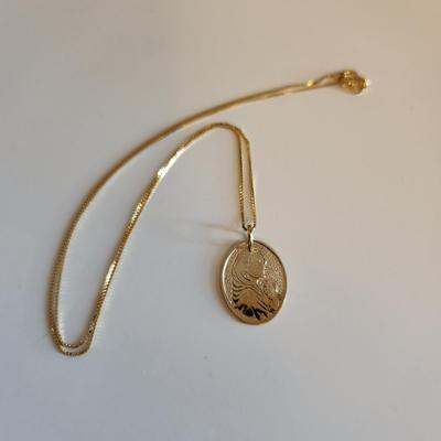 Sale Photo Thumbnail #251: This auction lot is for a 14K Gold Necklace with Madonna Medal.  The chain measures about 18-inches long and is marked 14K. The Madonna Medal is marked 14K.  The necklace with medal weighs about 3.1 grams by our scale.  Quite a nice and delicate religious