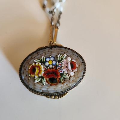 Sale Photo Thumbnail #302: This auction lot is for a Vintage Micro-Mosiac Pill Box Necklace.  This stunning brass pill box is so very handsome adorned with its beautiful micro-mosiac flower bouquet.  Where you gonna find another quite like this one.