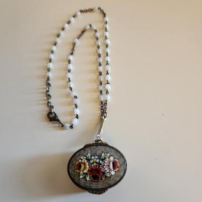 Sale Photo Thumbnail #300: This auction lot is for a Vintage Micro-Mosiac Pill Box Necklace.  This stunning brass pill box is so very handsome adorned with its beautiful micro-mosiac flower bouquet.  Where you gonna find another quite like this one.