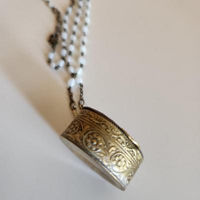 Sale Photo Thumbnail #303: This auction lot is for a Vintage Micro-Mosiac Pill Box Necklace.  This stunning brass pill box is so very handsome adorned with its beautiful micro-mosiac flower bouquet.  Where you gonna find another quite like this one.