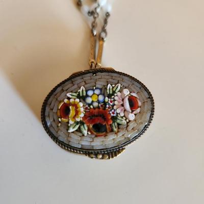 Sale Photo Thumbnail #301: This auction lot is for a Vintage Micro-Mosiac Pill Box Necklace.  This stunning brass pill box is so very handsome adorned with its beautiful micro-mosiac flower bouquet.  Where you gonna find another quite like this one.