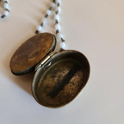 Sale Photo Thumbnail #305: This auction lot is for a Vintage Micro-Mosiac Pill Box Necklace.  This stunning brass pill box is so very handsome adorned with its beautiful micro-mosiac flower bouquet.  Where you gonna find another quite like this one.