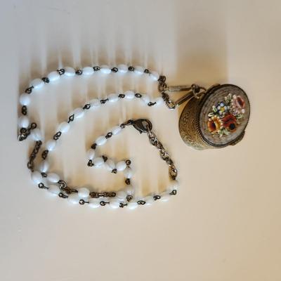 Sale Photo Thumbnail #306: This auction lot is for a Vintage Micro-Mosiac Pill Box Necklace.  This stunning brass pill box is so very handsome adorned with its beautiful micro-mosiac flower bouquet.  Where you gonna find another quite like this one.