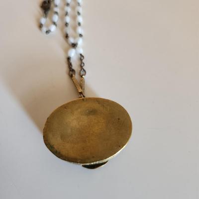 Sale Photo Thumbnail #304: This auction lot is for a Vintage Micro-Mosiac Pill Box Necklace.  This stunning brass pill box is so very handsome adorned with its beautiful micro-mosiac flower bouquet.  Where you gonna find another quite like this one.