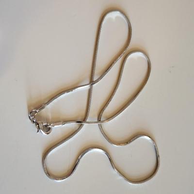 Sale Photo Thumbnail #312: This auction lot is for Four Sterling Silver Necklaces. Three necklace are marked 925.  There is a 16-inch necklace with a large cut glass stone, another 14-inch necklace with a pendant of silver overlay on jade stone, a very delicate 17-inch chain with a