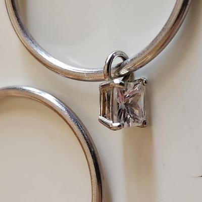 Sale Photo Thumbnail #325: This auction lot is for a Trio of Sterling Silver Jewelry.  This trio consists of a fancy pin with cut glass gems, a pair of sterling earrings with cut glass stones and a very nice 18-inch necklace with a drilled pearl as pendant.  All are marked 925.  Bu