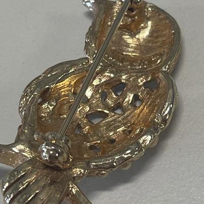 Napier bird pin and vintage guilloche pin