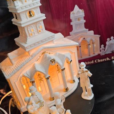 Porcelain Illuminated “Christmas Church & Caroler” 8-Piece Lighted Holiday Village Set – White & Gold Accents