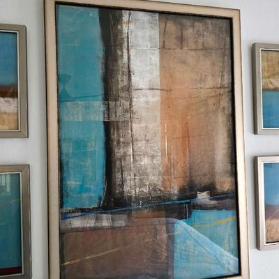 Sale Photo Thumbnail #276: Five Piece Set Contemporary Abstract Wall Art in pleasant hues of blue, brown, gold, and cream. Unsigned decorative art. The large center piece measures 38"H x 26"W. The four smaller pieces measure 13.5"H x 13.5"W. You are bidding on the set of five.