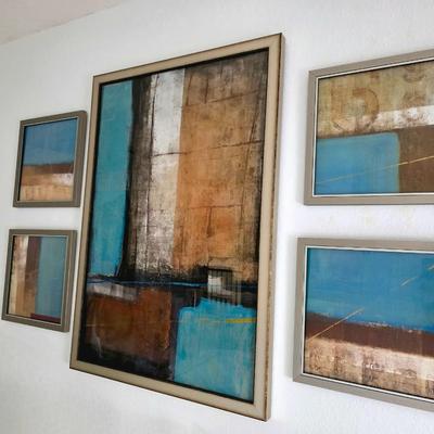 Sale Photo Thumbnail #274: Five Piece Set Contemporary Abstract Wall Art in pleasant hues of blue, brown, gold, and cream. Unsigned decorative art. The large center piece measures 38"H x 26"W. The four smaller pieces measure 13.5"H x 13.5"W. You are bidding on the set of five.