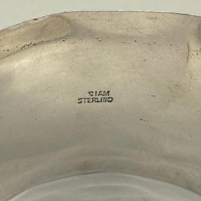 Sale Photo Thumbnail #756: Most likely Mid Century design.  Wide, non-flexible cuff.  Highly decorated with rosettes, hollow beads and floral motifs.  2.5" wide. A successful wire transfer is required if this item is to be shipped.  [RM]