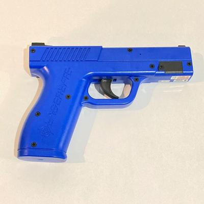 LOT 29: LaserLyte LT-TTL 008821 Trigger Blue Pistol with Built In Laser and Box of Dynamic Shooters Paper Shooting Targets