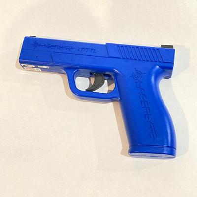 LOT 29: LaserLyte LT-TTL 008821 Trigger Blue Pistol with Built In Laser and Box of Dynamic Shooters Paper Shooting Targets