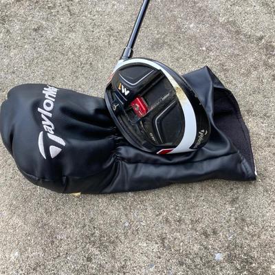 LOT 33: Collection of Golf Clubs and Accessories - Taylor Made, Callaway, Ram, Vesuvius Ceramic Putter with Ogio Golf Bag