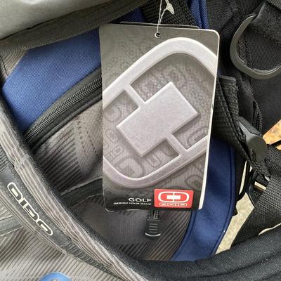 LOT 33: Collection of Golf Clubs and Accessories - Taylor Made, Callaway, Ram, Vesuvius Ceramic Putter with Ogio Golf Bag