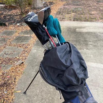 LOT 33: Collection of Golf Clubs and Accessories - Taylor Made, Callaway, Ram, Vesuvius Ceramic Putter with Ogio Golf Bag